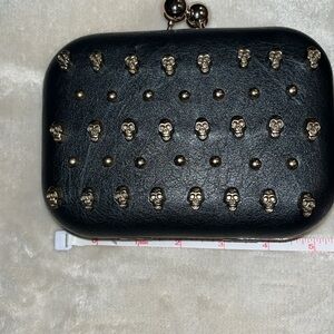 SKULL ❤️Modern handbag golden black with a gold chain 2 inches deep approx
